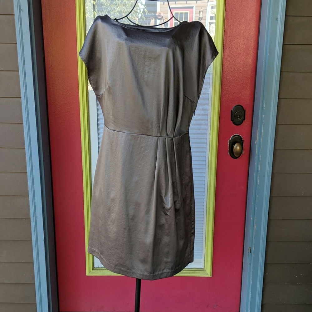 Grey satin dress with side pleat detail.